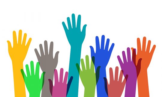 Hand up of crowd. Silhouette of hand people raised for vote, charity and happy. Many color volunteer arms on white background. Group of fun humans with hands up. Concept of democracy, freedom. Vector.